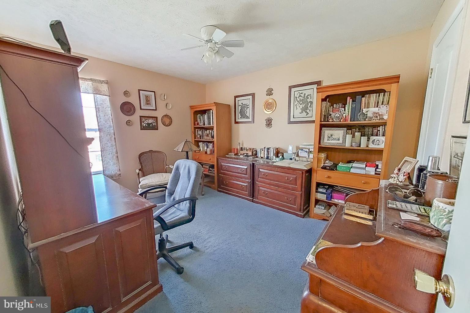1 Bancroft Street Taneytown, MD 21787 - Photo 19 of 35 a view of a workspace with furniture and a window