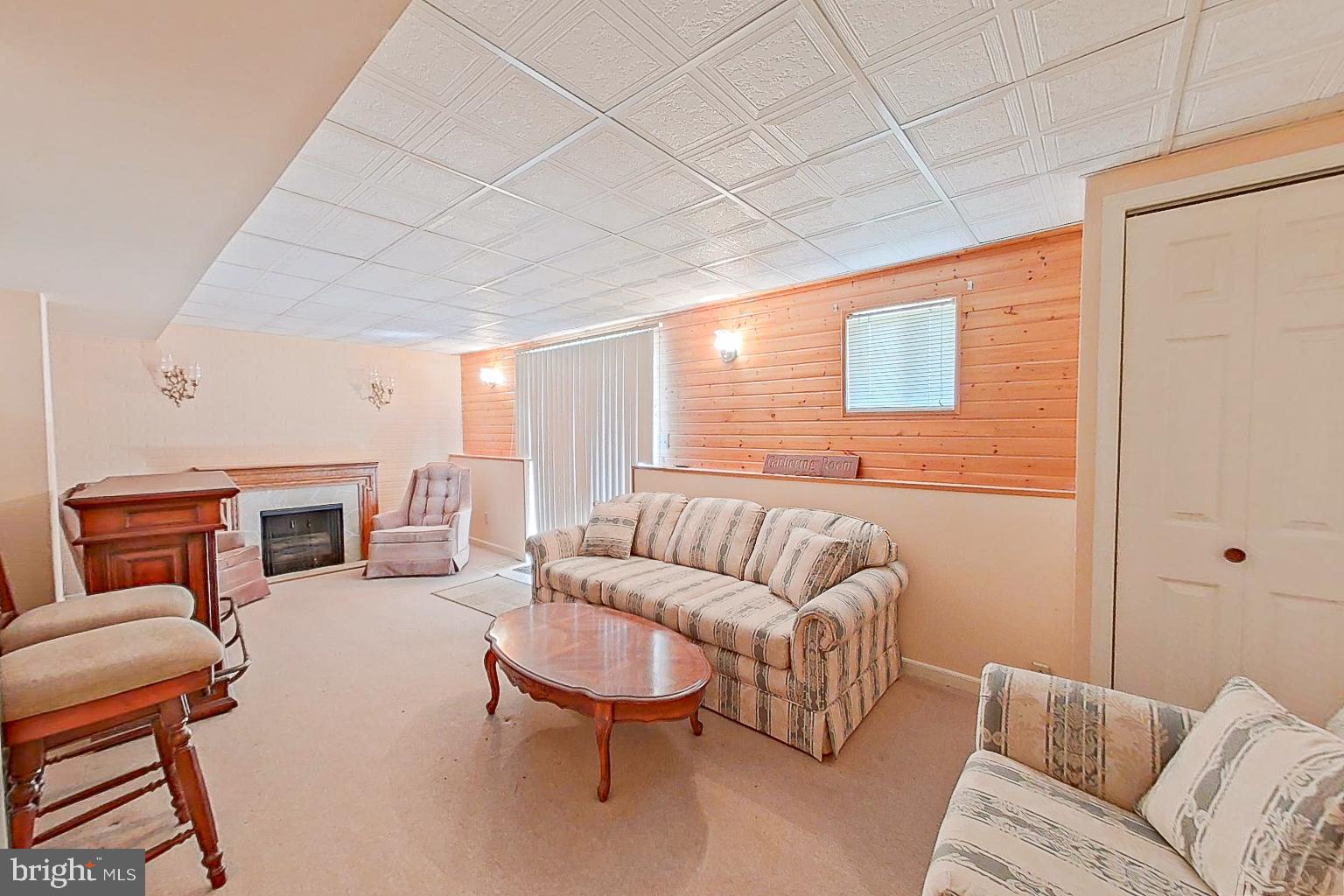 1 Bancroft Street Taneytown, MD 21787 - Photo 21 of 35 a living room with furniture and a fireplace