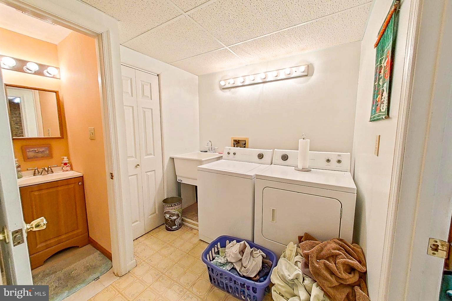 1 Bancroft Street Taneytown, MD 21787 - Photo 27 of 35 a utility room with dryer and washer