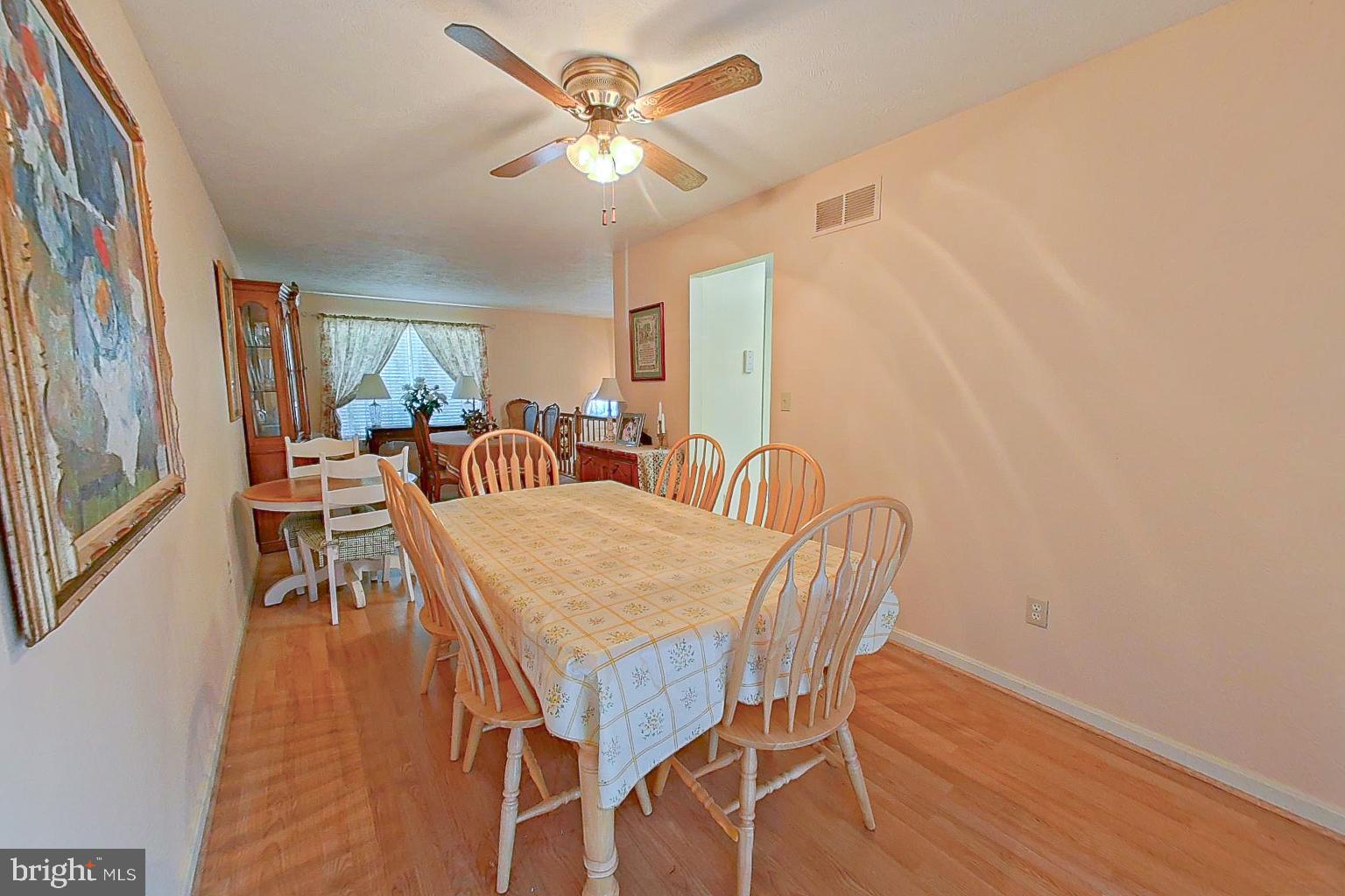 1 Bancroft Street Taneytown, MD 21787 - Photo 9 of 35 a view of a dining room with furniture and a chandelier