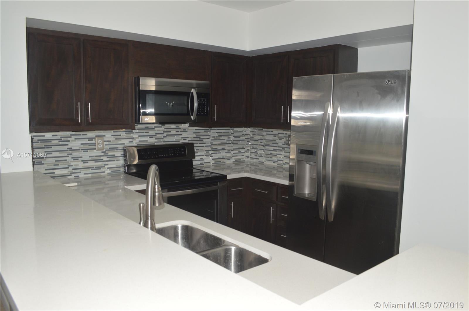 8299 Balgowan Road, Unit 8299 Miami Lakes, FL 33016 - Photo 5 of 33 Gallery Image 5