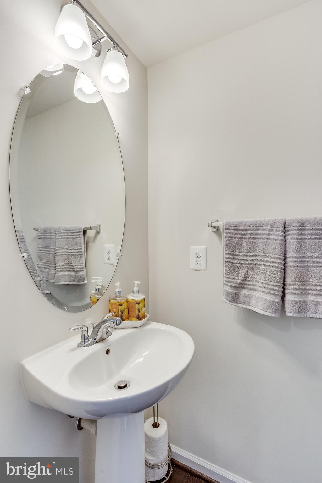 1216 Ribbon Limestone Terrace Southeast Leesburg, VA 20175 - Photo 9 of 33 Convenient main level powder room