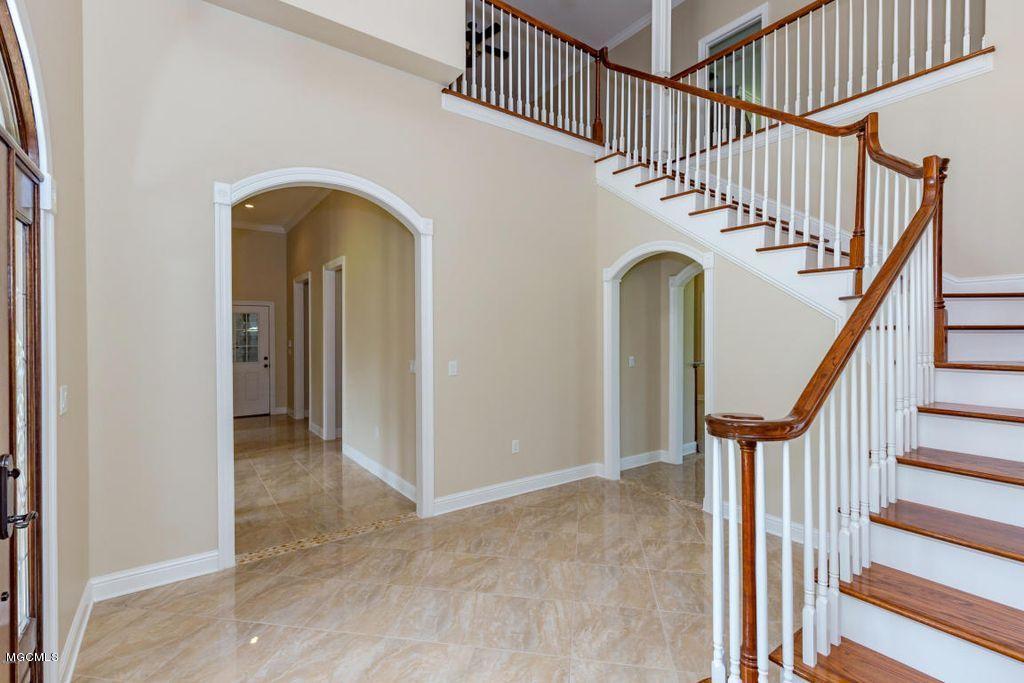 10720 Antioch Road Vancleave, MS 39565 - Photo 14 of 70 -14 - LW - FOYER & STAIRWAY (View 2)