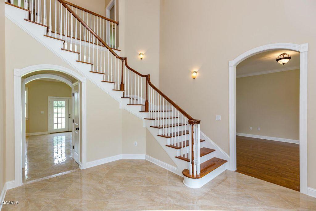 10720 Antioch Road Vancleave, MS 39565 - Photo 15 of 70 -15 - LW - ENTRY FOYER AND STAIRWAY