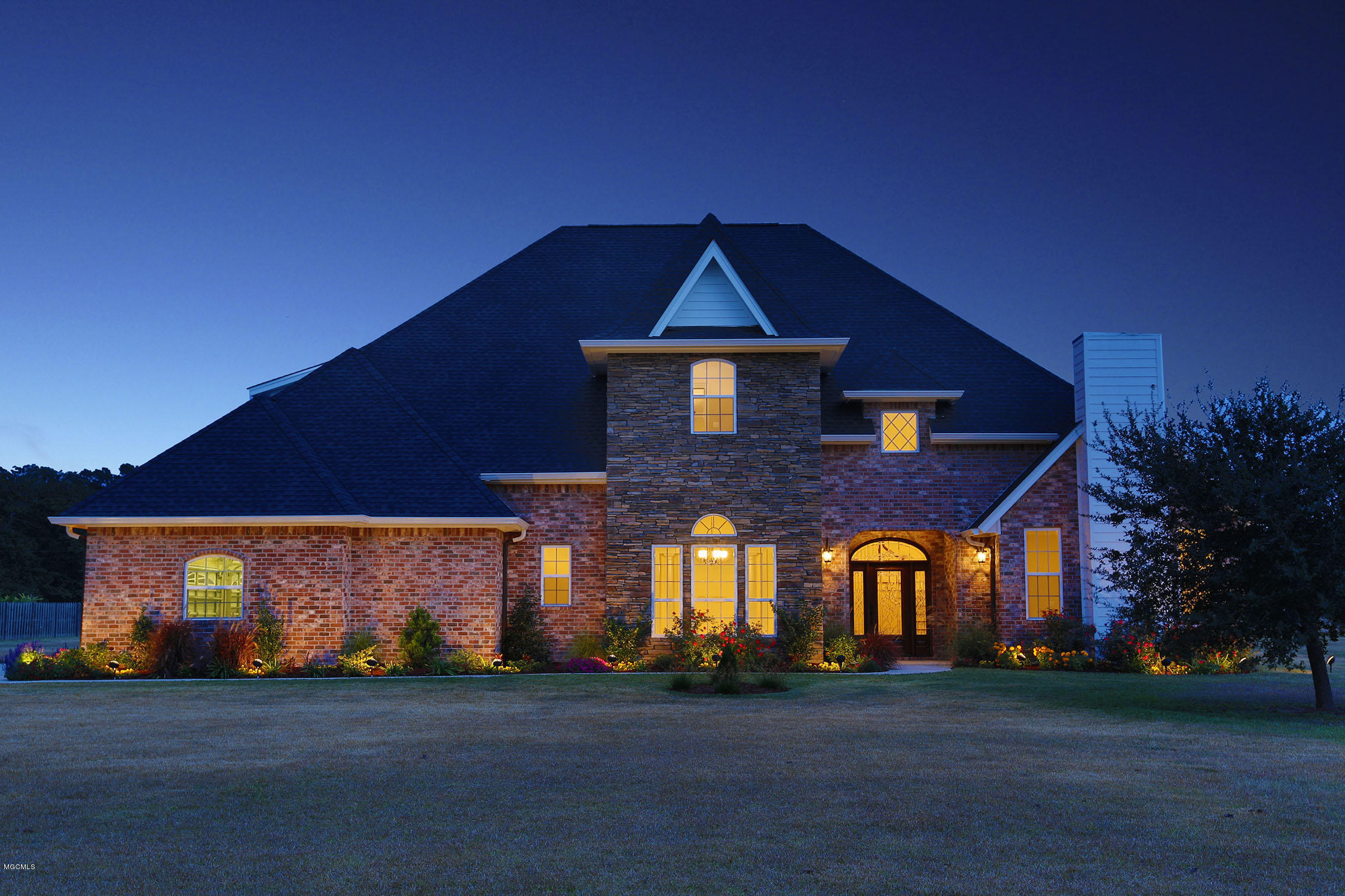 10720 Antioch Road Vancleave, MS 39565 - Photo 2 of 70 -02 - TWILIGHT VIEW of FRONT of HOUSE