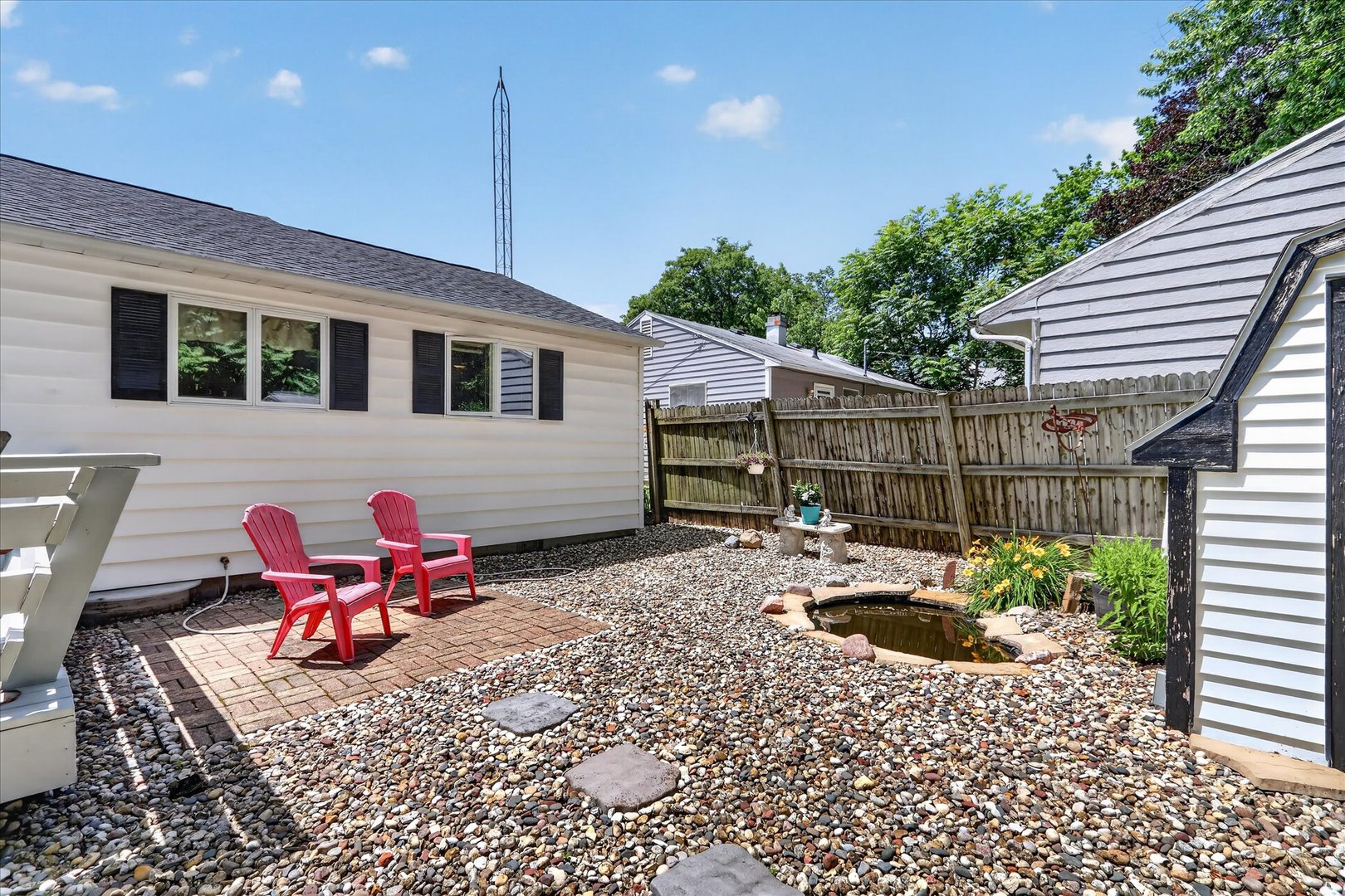 1204 West Violet Street Freeport, IL 61032 - Photo 32 of 36 a backyard of a house with yard and outdoor seating