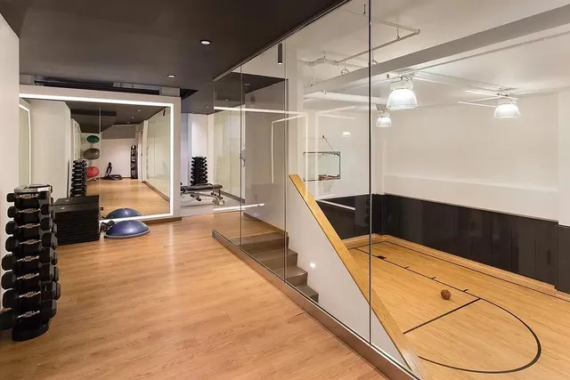 a lobby with a couch and a view of living room