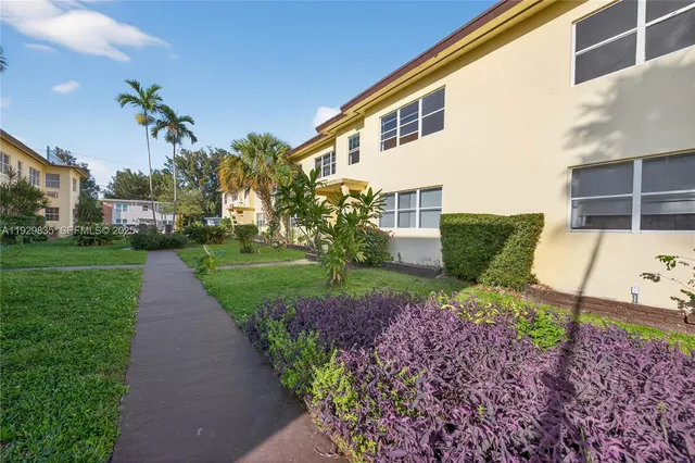 a view of swimming pool with a patio