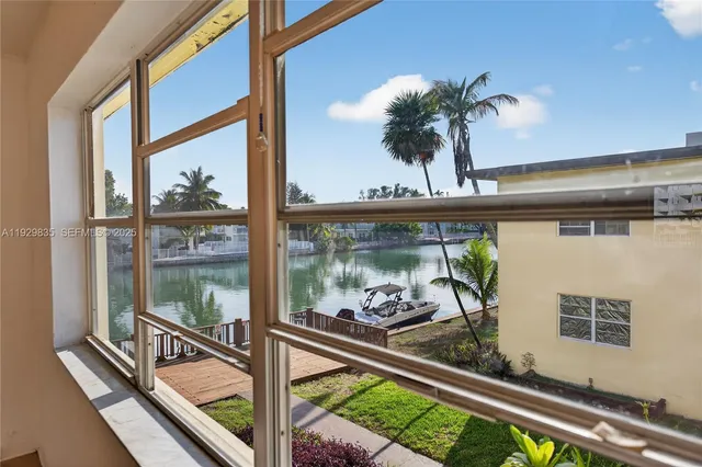 a kitchen with a refrigerator and a stove