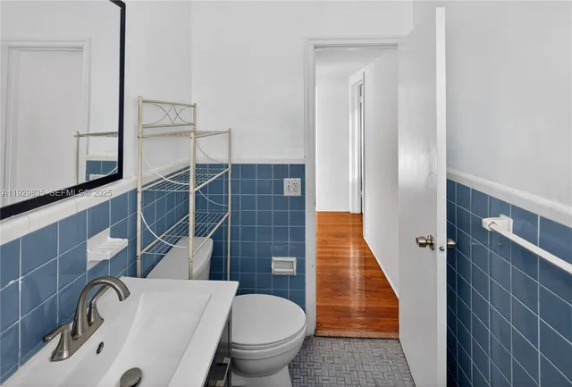 a view of a glass door with a balcony