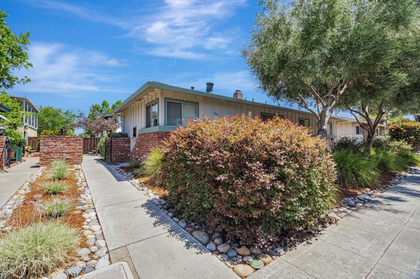 869 Bing Drive Santa Clara, CA 95051 - Photo 3 of 11 a front view of a house with a yard