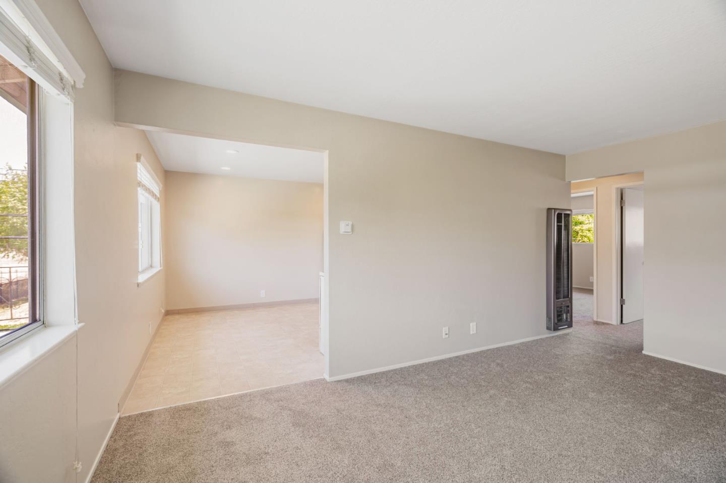 869 Bing Drive Santa Clara, CA 95051 - Photo 6 of 11 an empty room with windows and closet