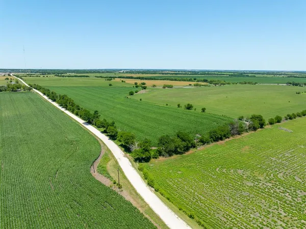 a view of a lake with a big yard