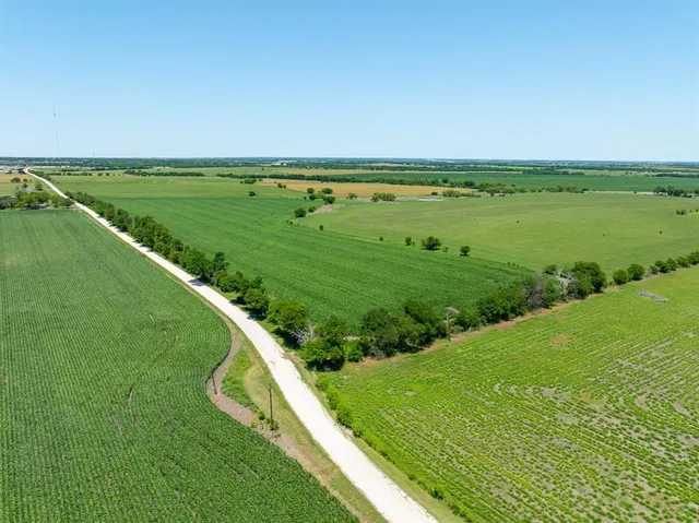 a view of a lake with a big yard