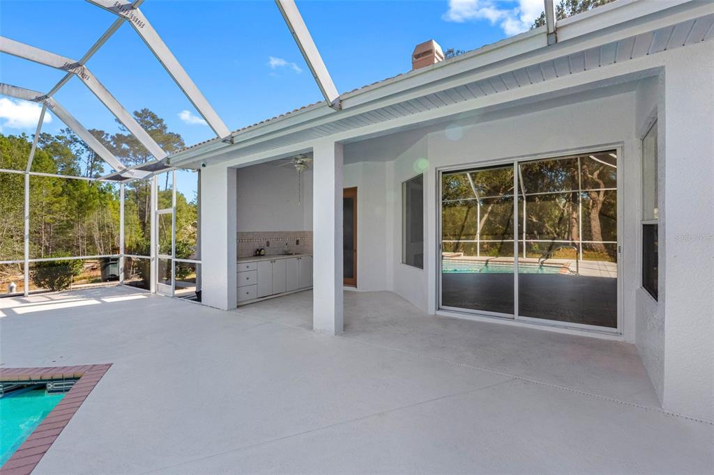 9336 Tooke Shore Drive Weeki Wachee, FL 34613 - Photo 11 of 44 a view of an empty room with a window