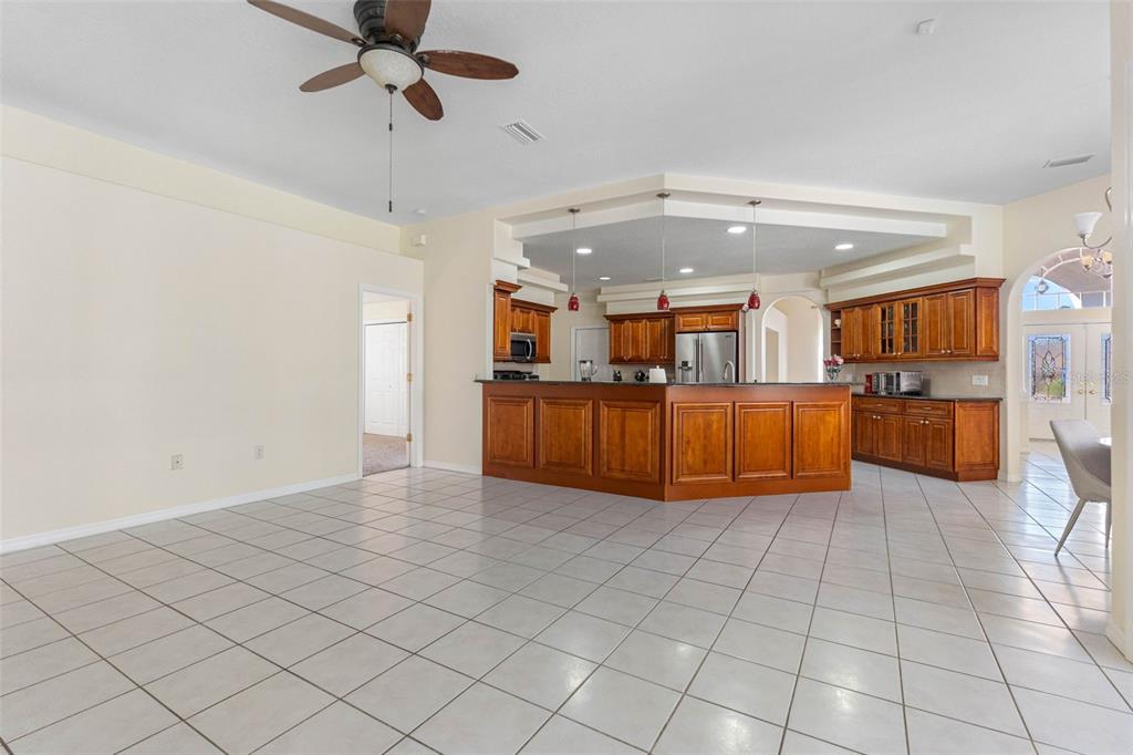 9336 Tooke Shore Drive Weeki Wachee, FL 34613 - Photo 10 of 44 a view of a kitchen with furniture and a kitchen