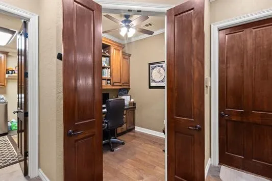 a view of workspace with wooden floor