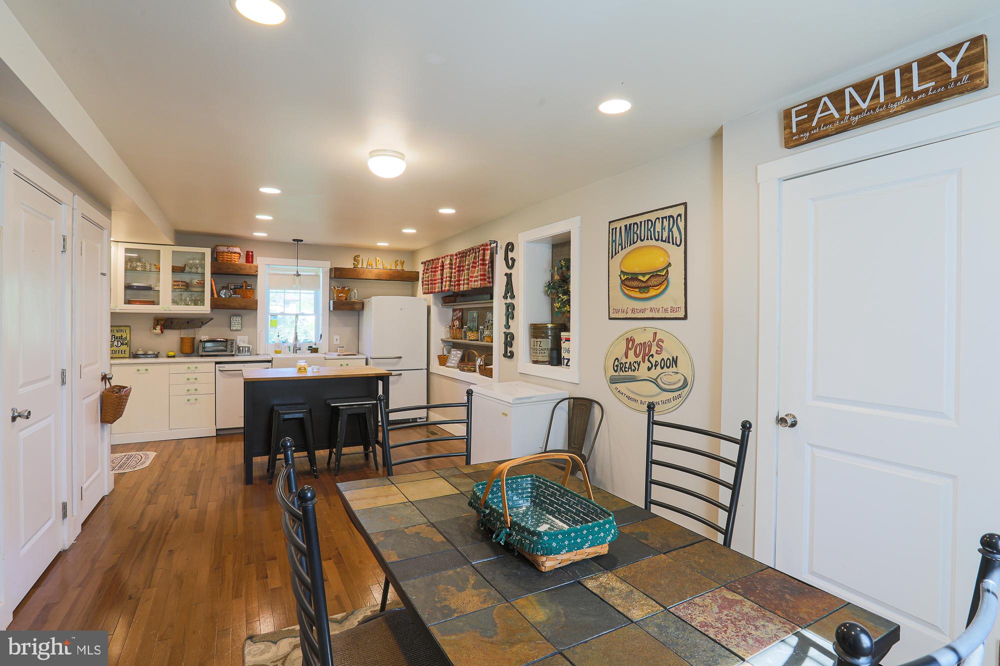4604 East Joppa Road Perry Hall, MD 21128 - Photo 11 of 56 a living room with stainless steel appliances furniture and rug