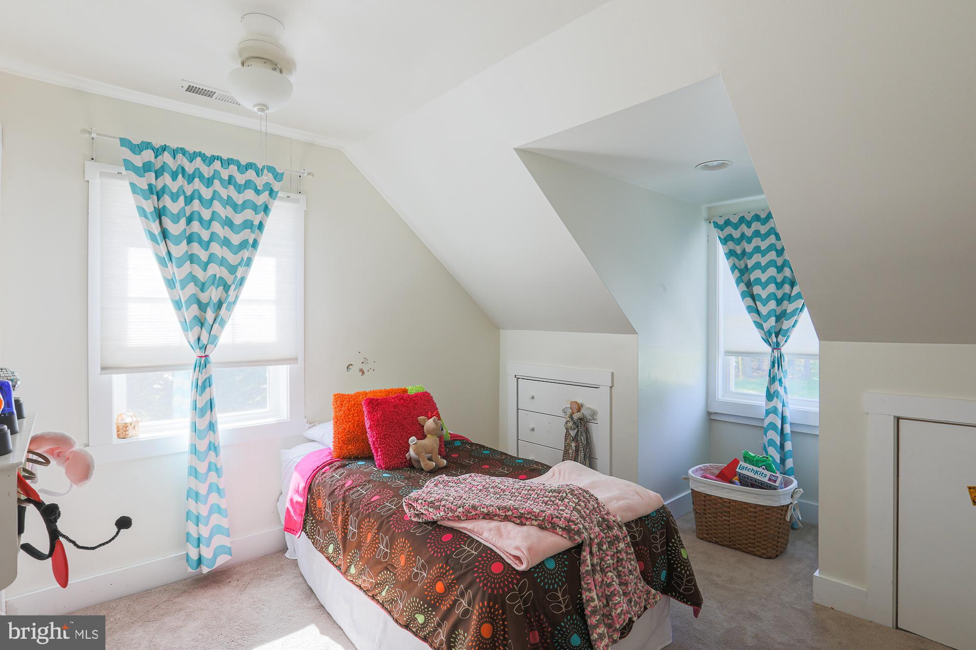 4604 East Joppa Road Perry Hall, MD 21128 - Photo 17 of 56 a bedroom with a bed and a window
