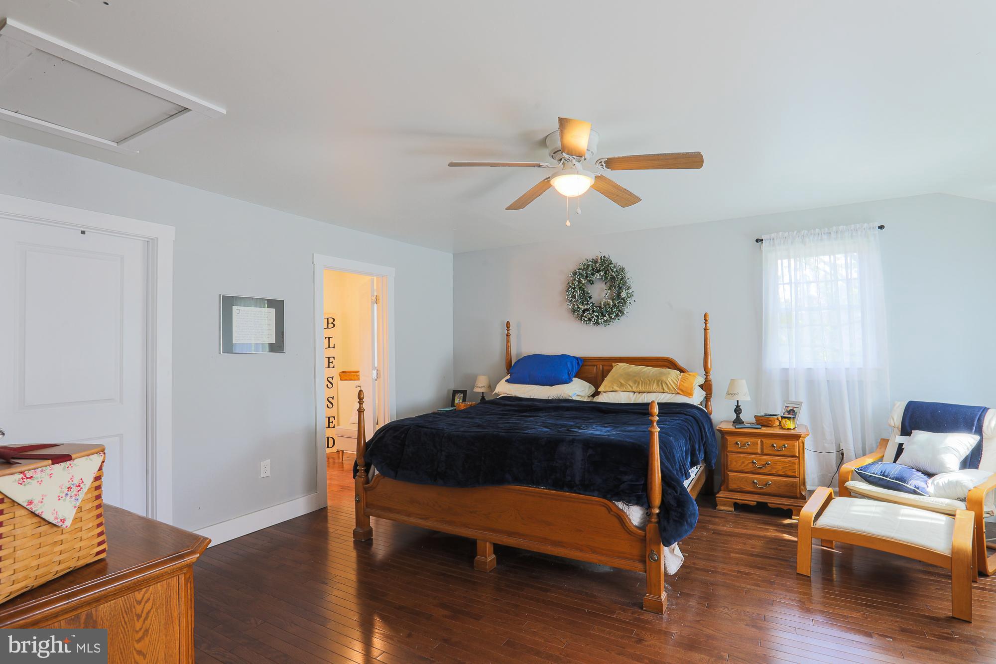 4604 East Joppa Road Perry Hall, MD 21128 - Photo 20 of 56 a bedroom with a bed and wooden floor