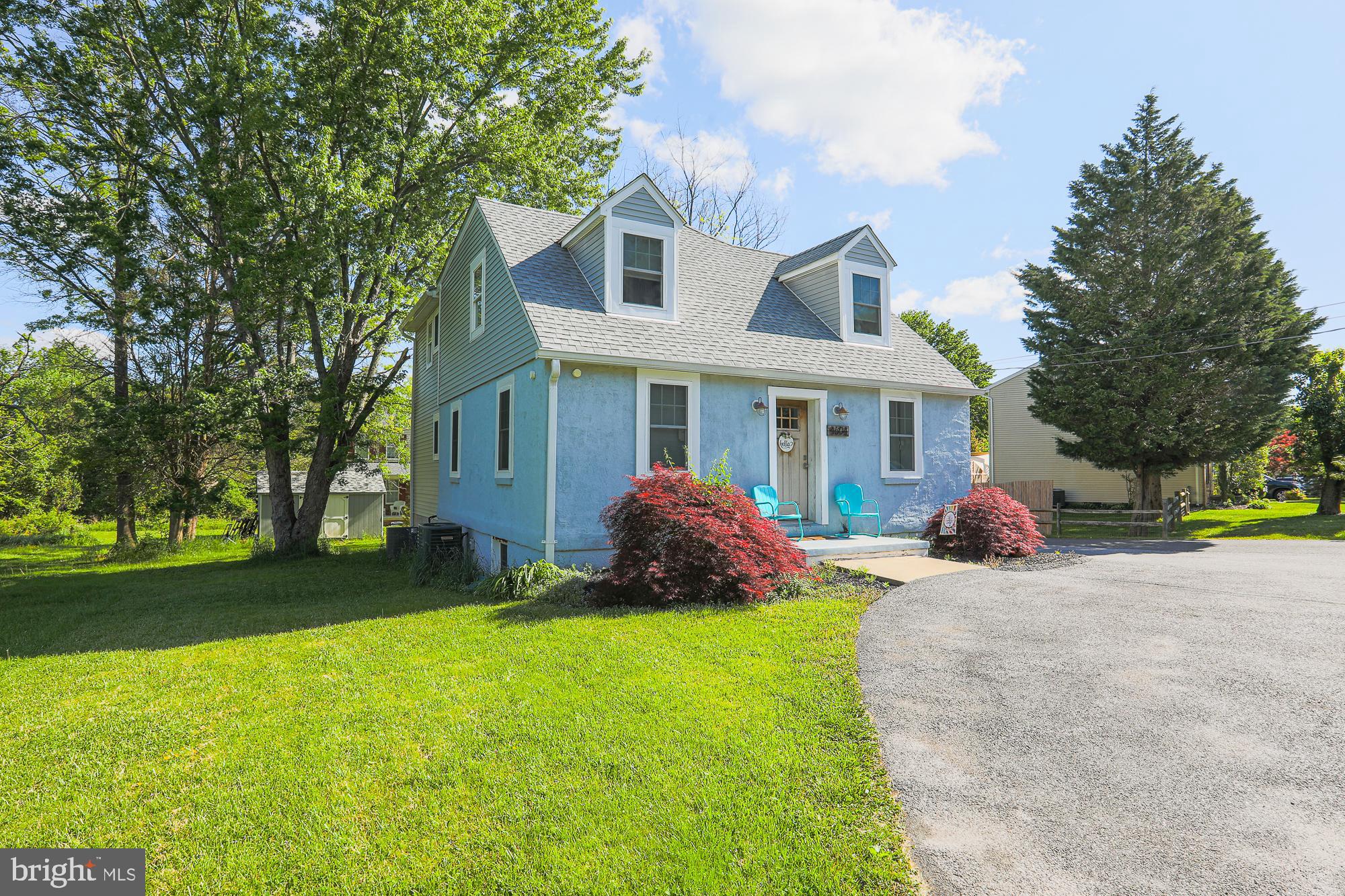 4604 East Joppa Road Perry Hall, MD 21128 - Photo 3 of 56 a view of a house with a patio and a yard