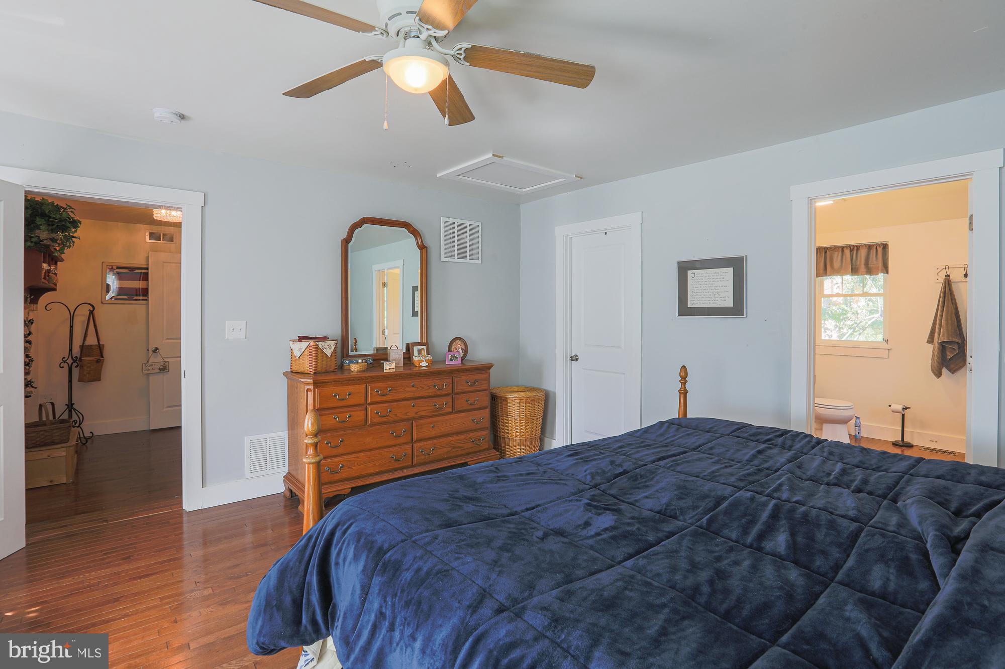 4604 East Joppa Road Perry Hall, MD 21128 - Photo 23 of 56 a bedroom with a bed and a dresser