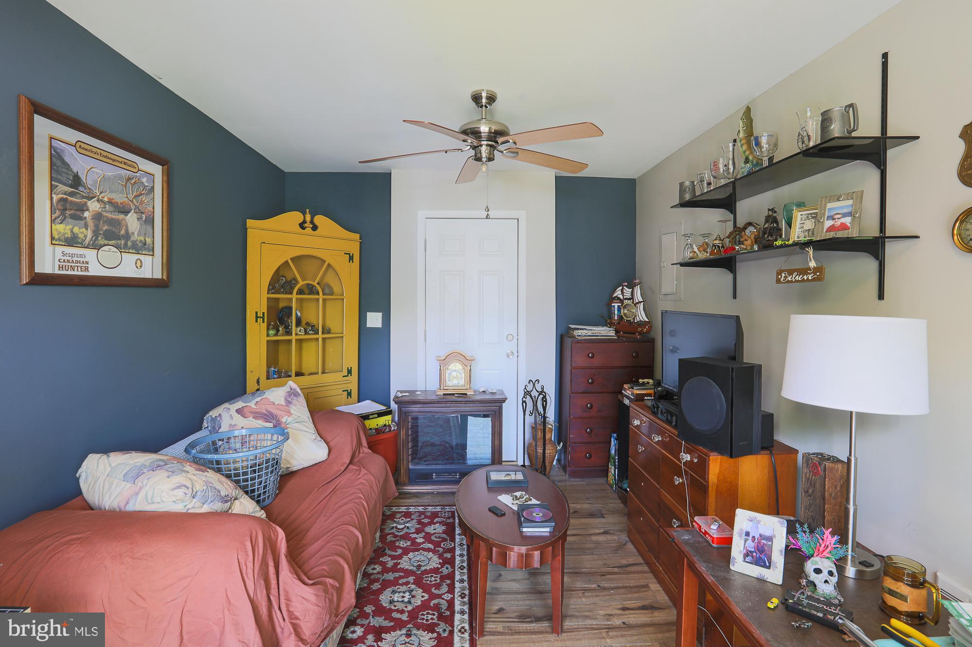 4604 East Joppa Road Perry Hall, MD 21128 - Photo 36 of 56 a living room with furniture and wooden floor