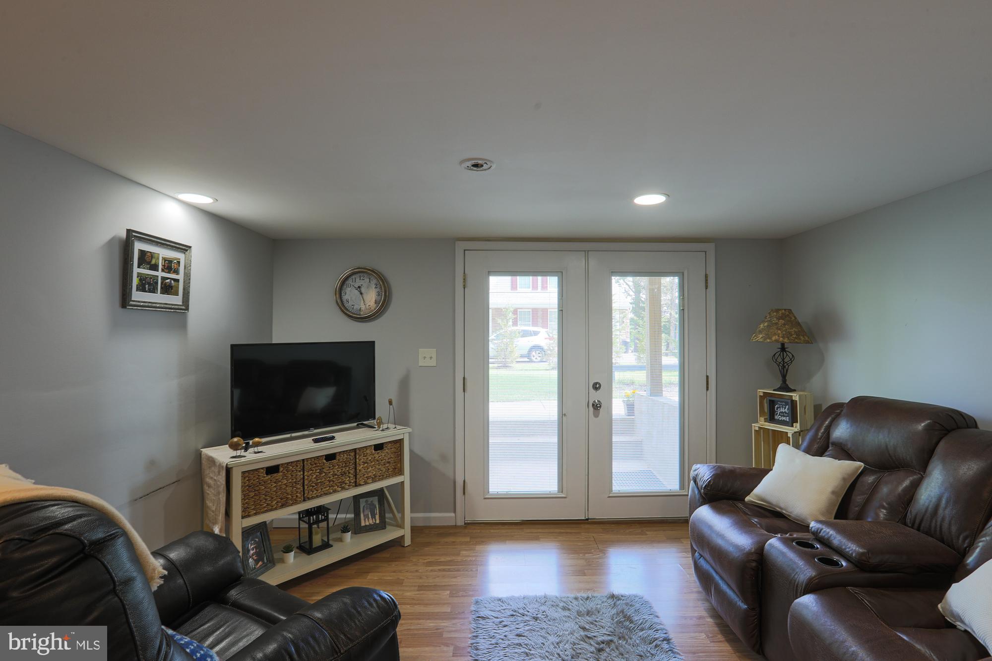 4604 East Joppa Road Perry Hall, MD 21128 - Photo 53 of 56 a living room with furniture and a flat screen tv