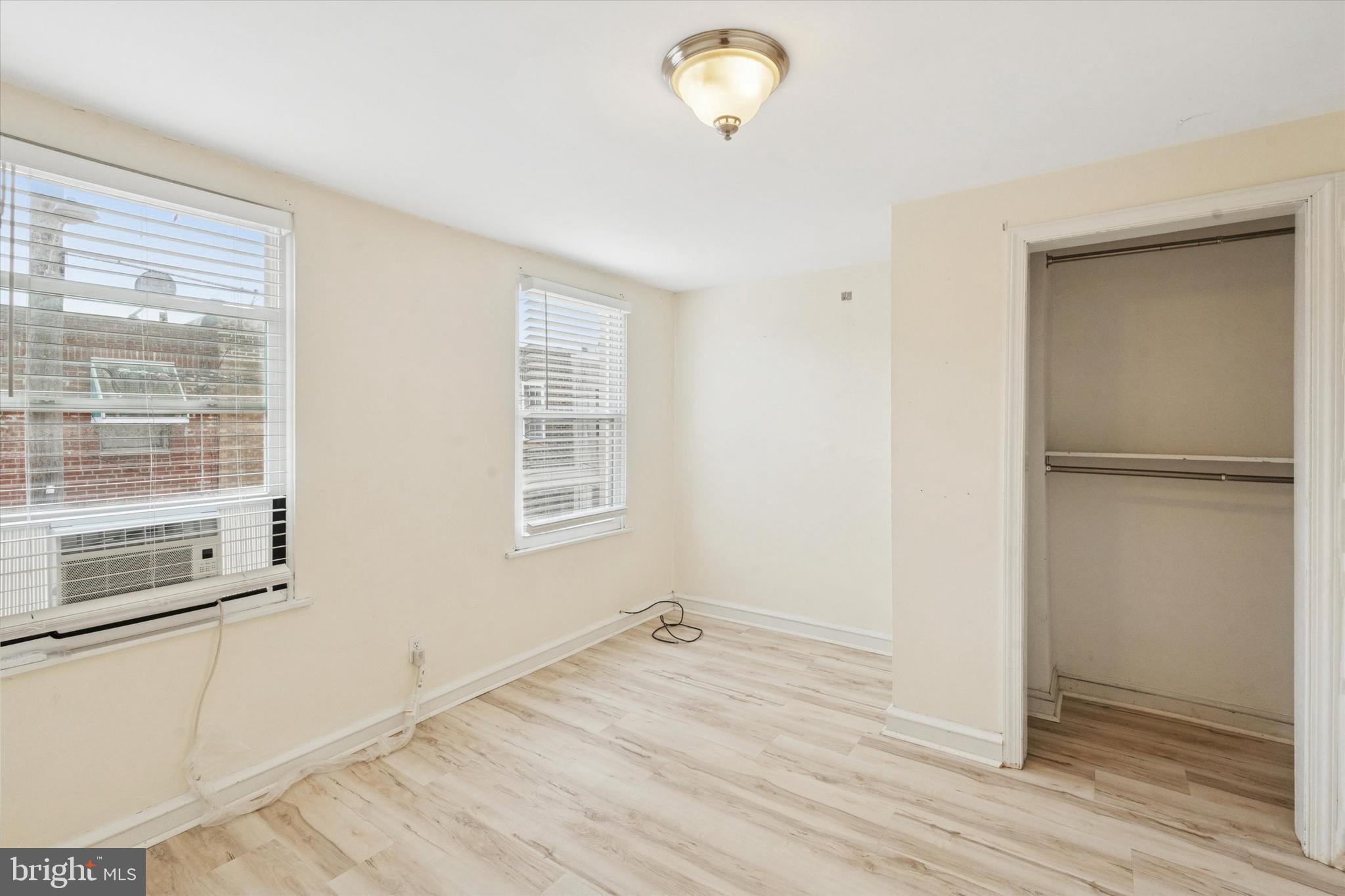 933 Cantrell Street Philadelphia, PA 19148 - Photo 23 of 25 a view of empty room with wooden floor and fan