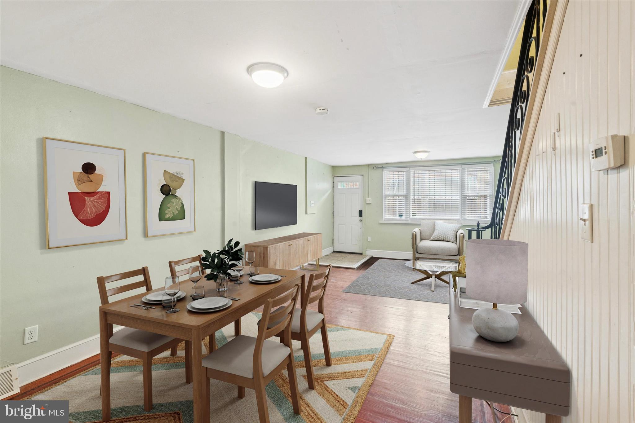 933 Cantrell Street Philadelphia, PA 19148 - Photo 5 of 25 a living room with furniture and a flat screen tv