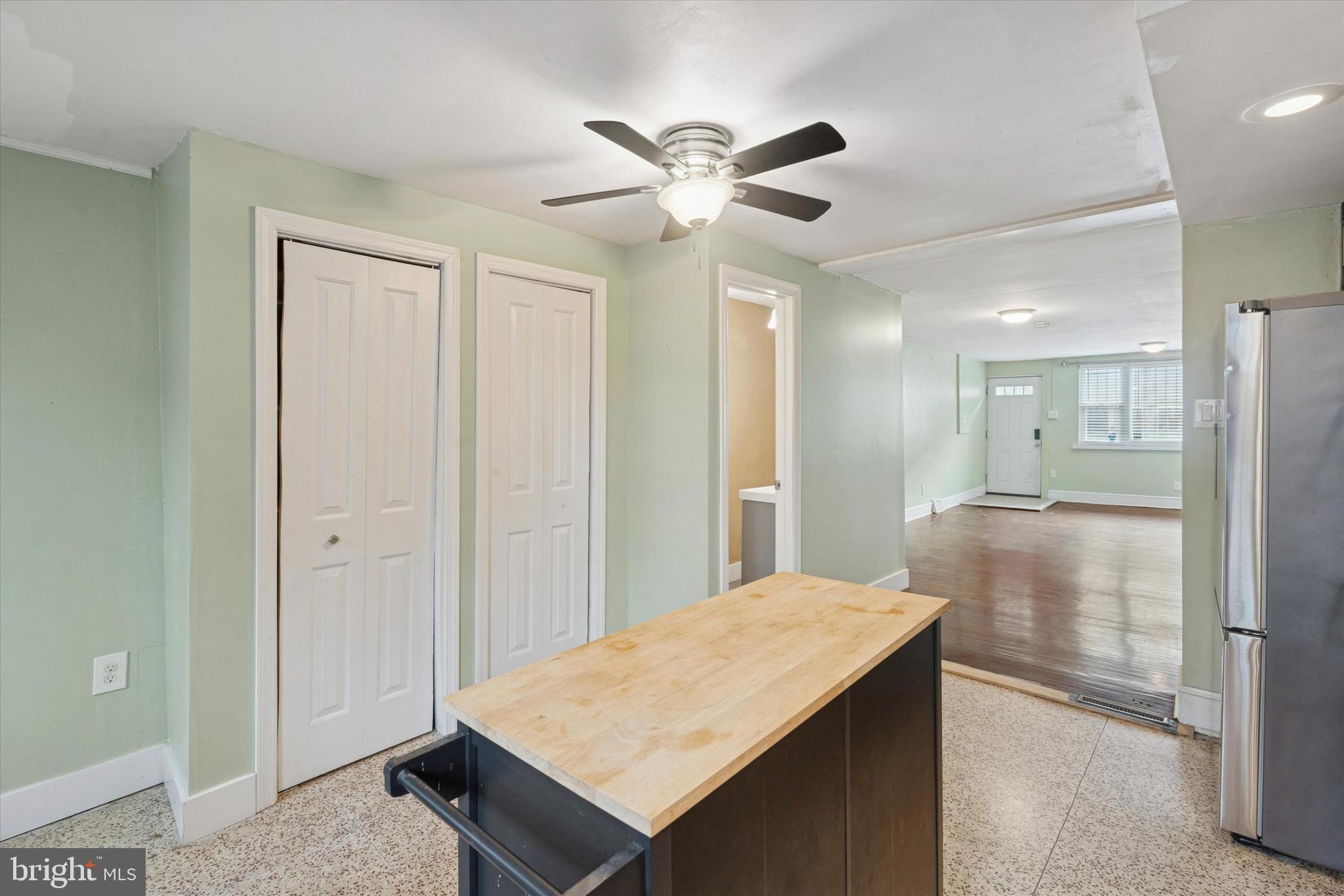 933 Cantrell Street Philadelphia, PA 19148 - Photo 9 of 25 a view of a kitchen cabinets and chandelier