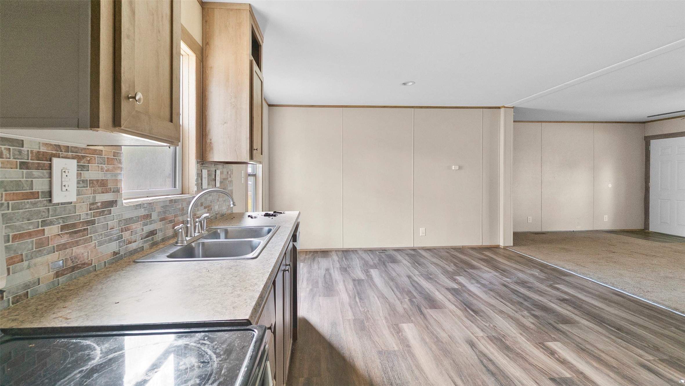 10499 Highway 156 Coldspring, TX 77331 - Photo 14 of 45 a view of kitchen with granite countertop cabinets and sink
