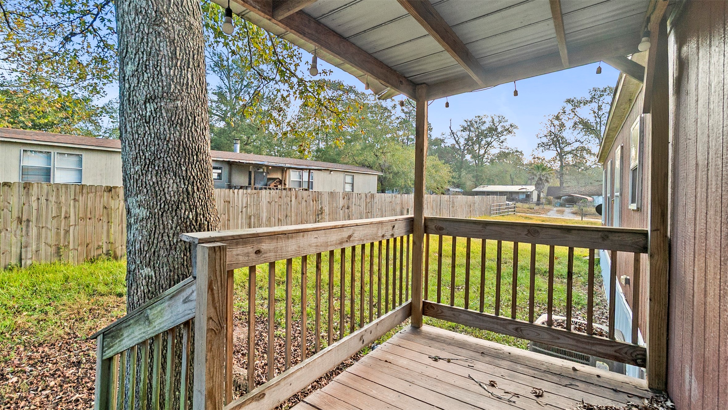 10499 Highway 156 Coldspring, TX 77331 - Photo 2 of 45 a view of a porch with a yard