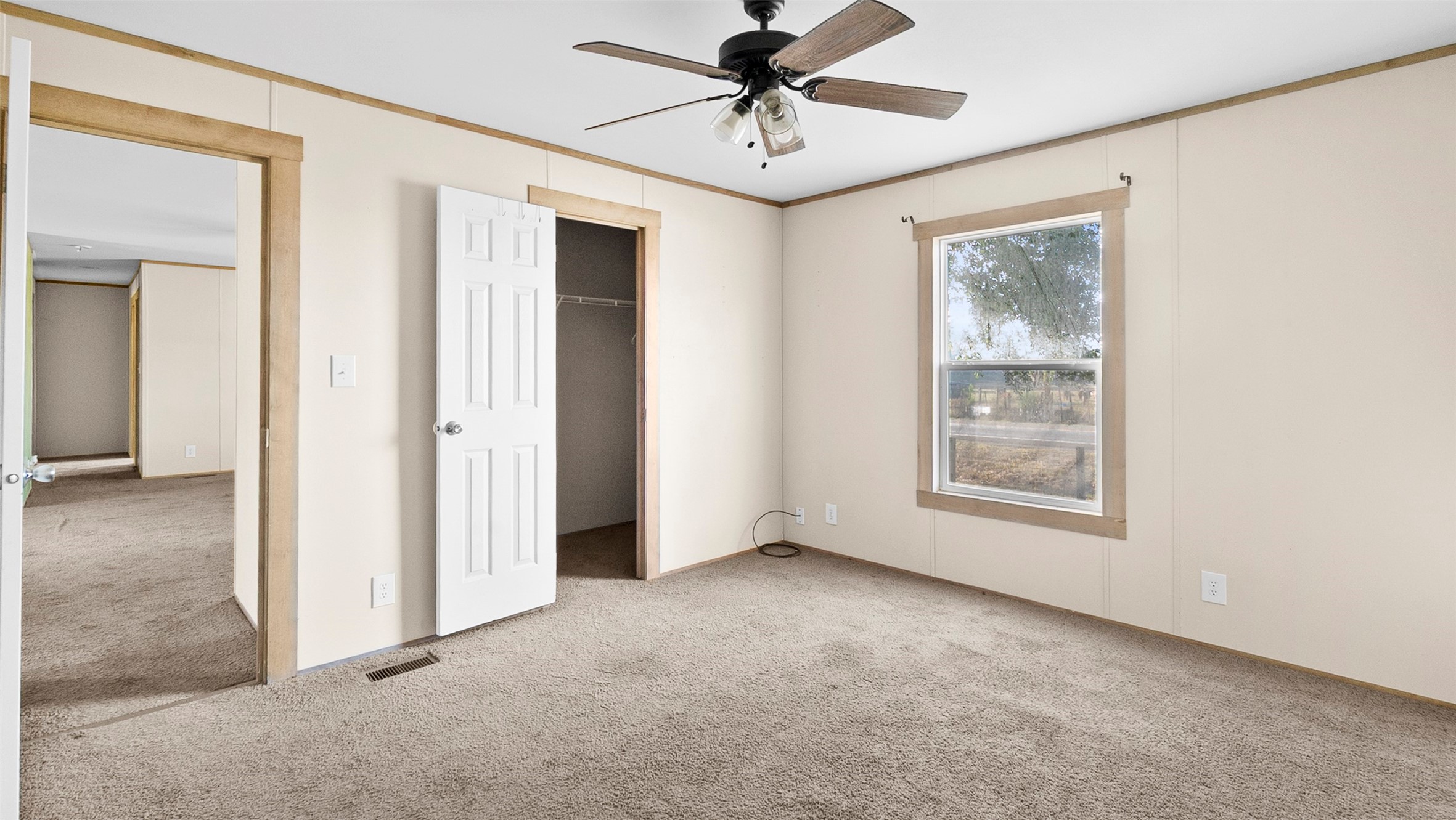 10499 Highway 156 Coldspring, TX 77331 - Photo 21 of 45 an empty room with windows and closet