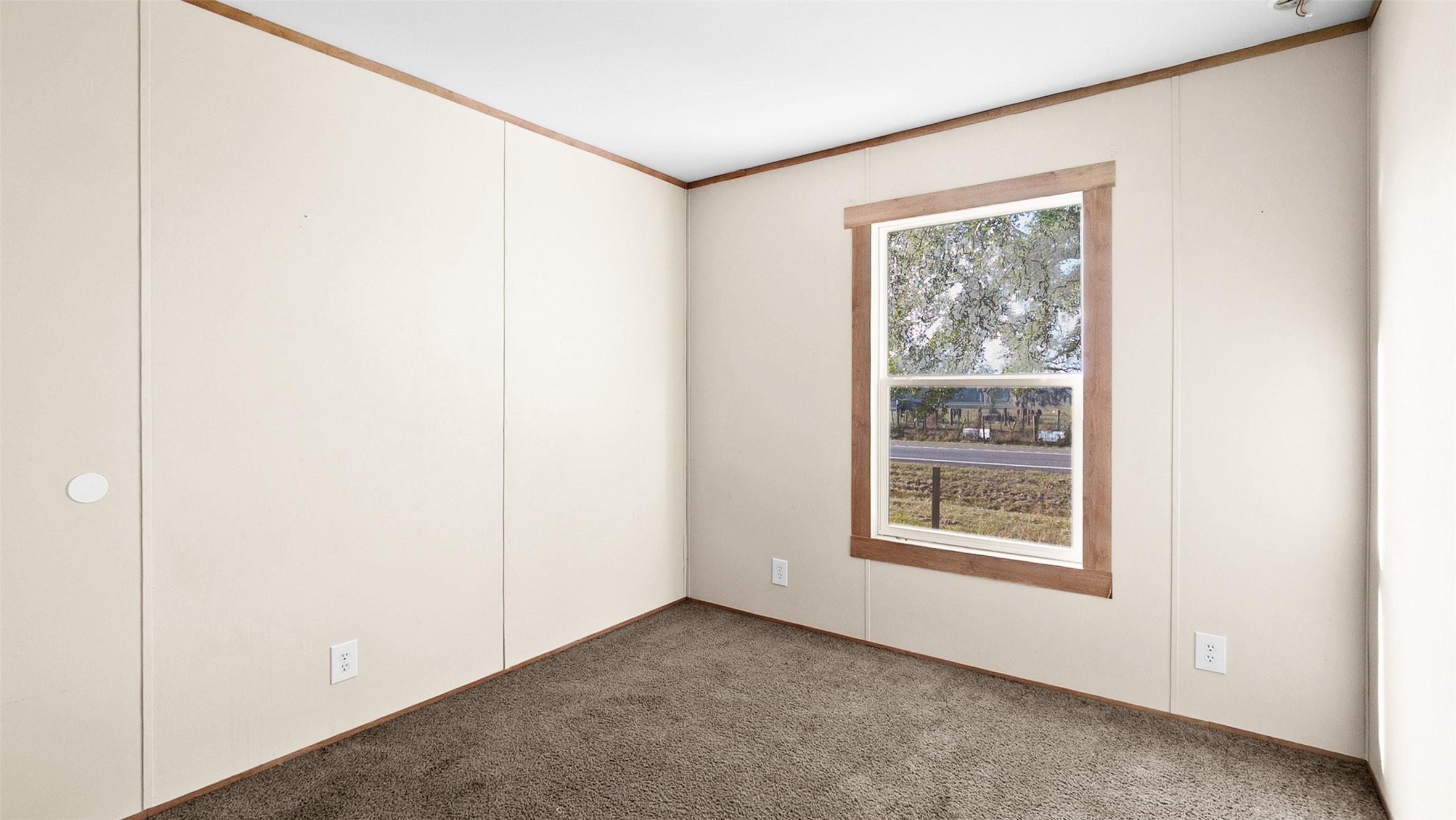 10499 Highway 156 Coldspring, TX 77331 - Photo 23 of 45 a view of a big room with windows and closet