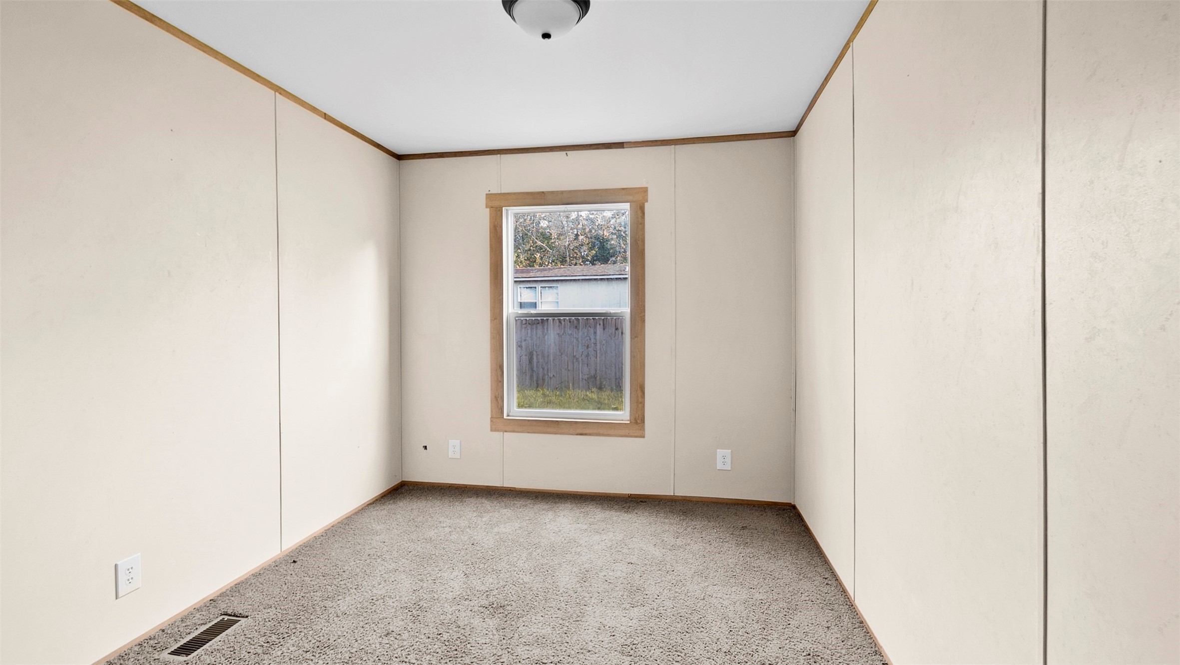 10499 Highway 156 Coldspring, TX 77331 - Photo 28 of 45 a view of an empty room with a window