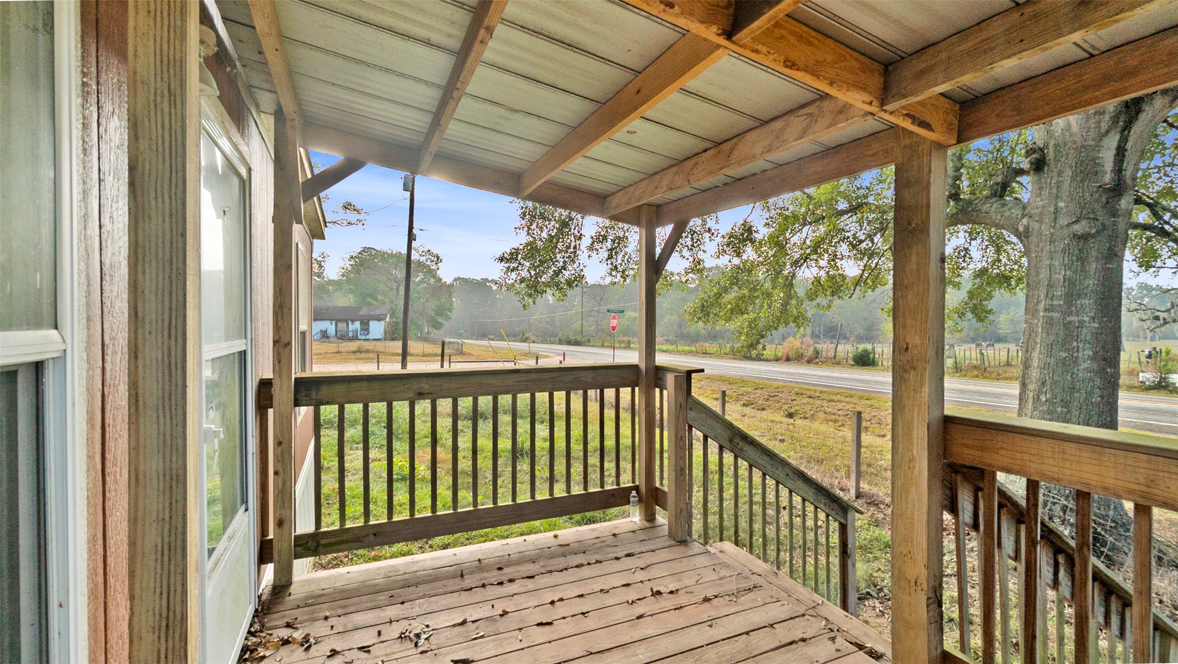 10499 Highway 156 Coldspring, TX 77331 - Photo 7 of 45 a view of a wooden deck