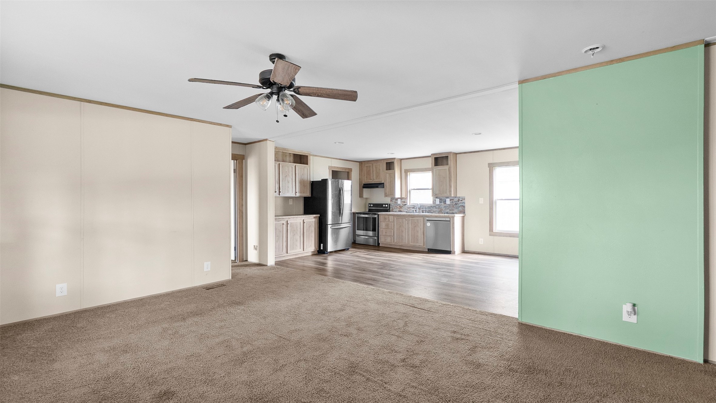 10499 Highway 156 Coldspring, TX 77331 - Photo 10 of 45 a view of a kitchen with a sink and cabinet area
