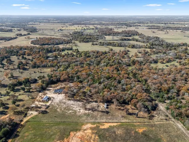 a living room with furniture fireplace and a flat screen tv