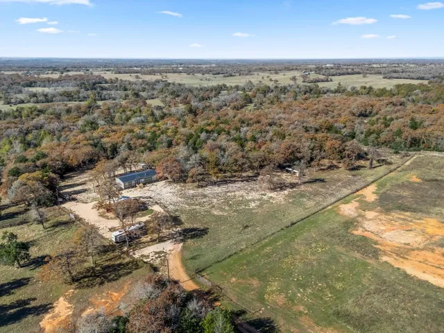 a kitchen with lots of counter top space and stainless steel appliances