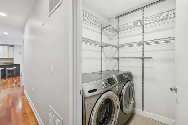 a view of a room with washer and dryer