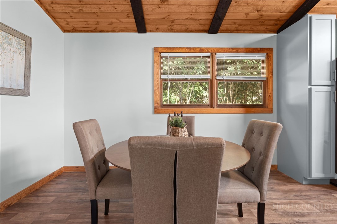 139 Golden Rod Loop Newland, NC 28657 - Photo 15 of 39 a dining room with furniture and window