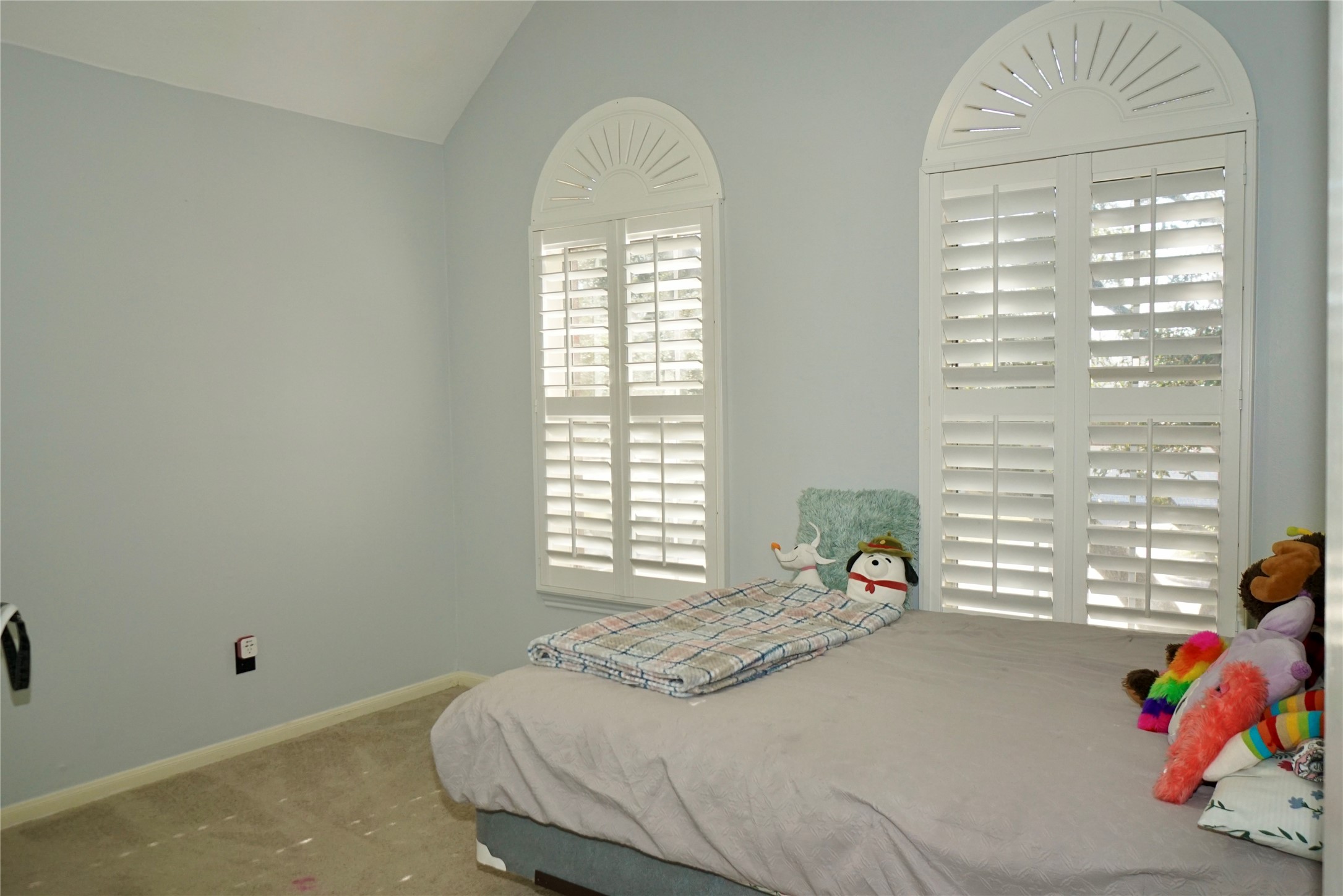 1806 Shadow Haven Court Fresno, TX 77545 - Photo 15 of 22 a bedroom with a bed and a window