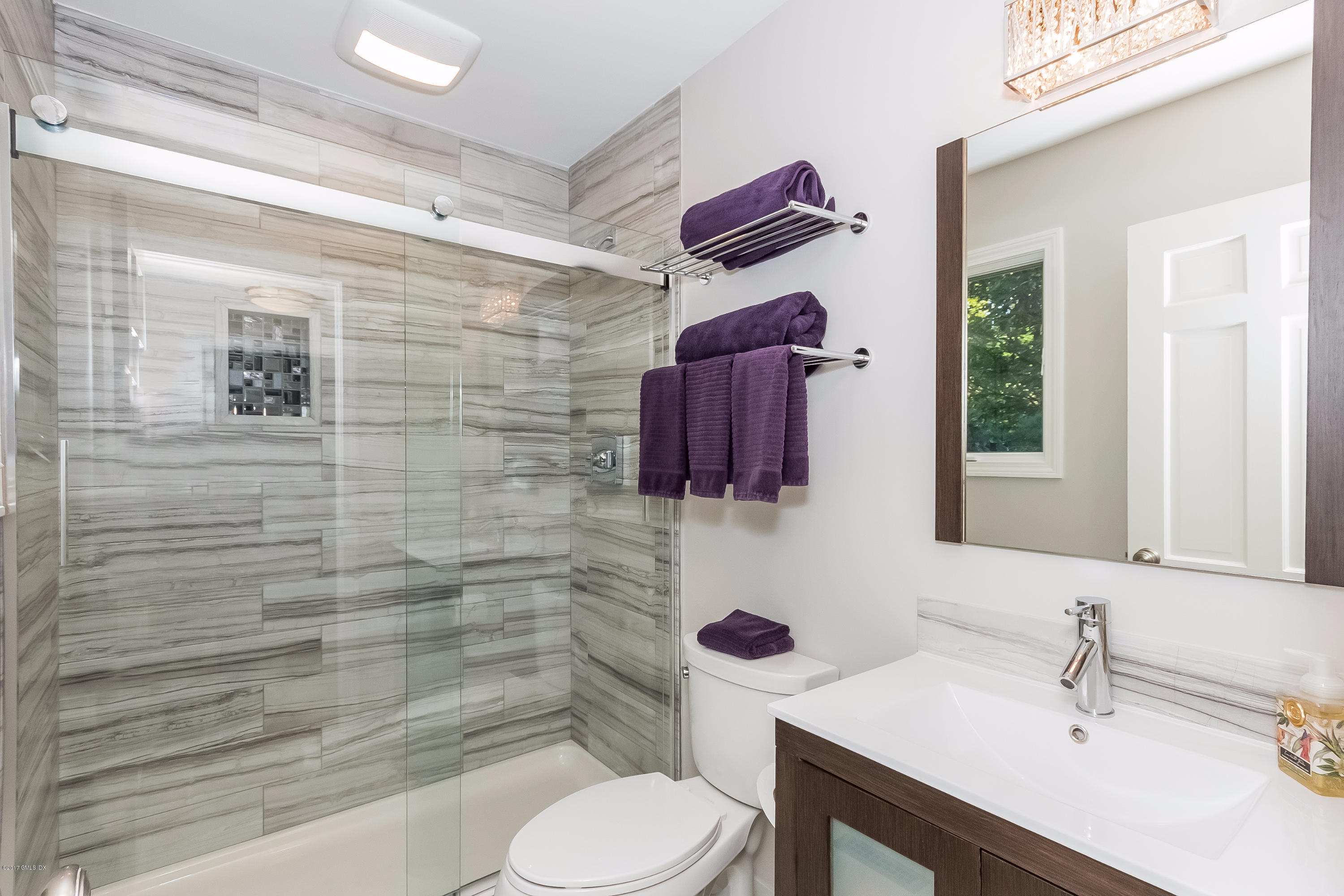 85 Perkins Road Greenwich, CT 06830 - Photo 16 of 36 a bathroom with a sink toilet and shower