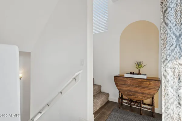 a view of a room with a table and chair