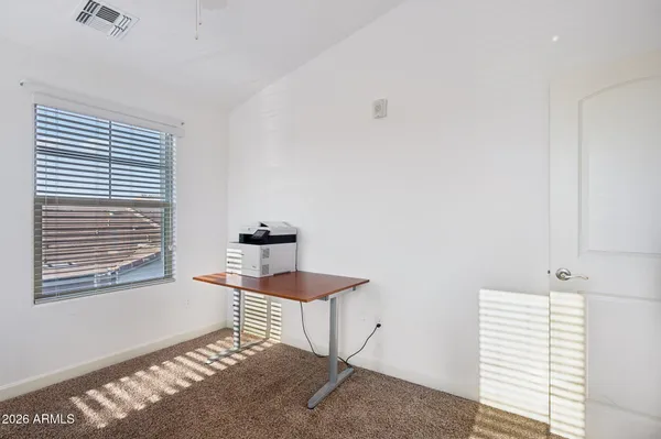 a bathroom with a sink and a window