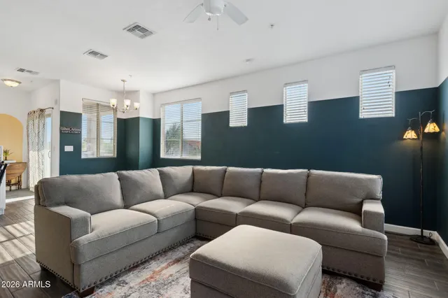 a living room with furniture and a couch