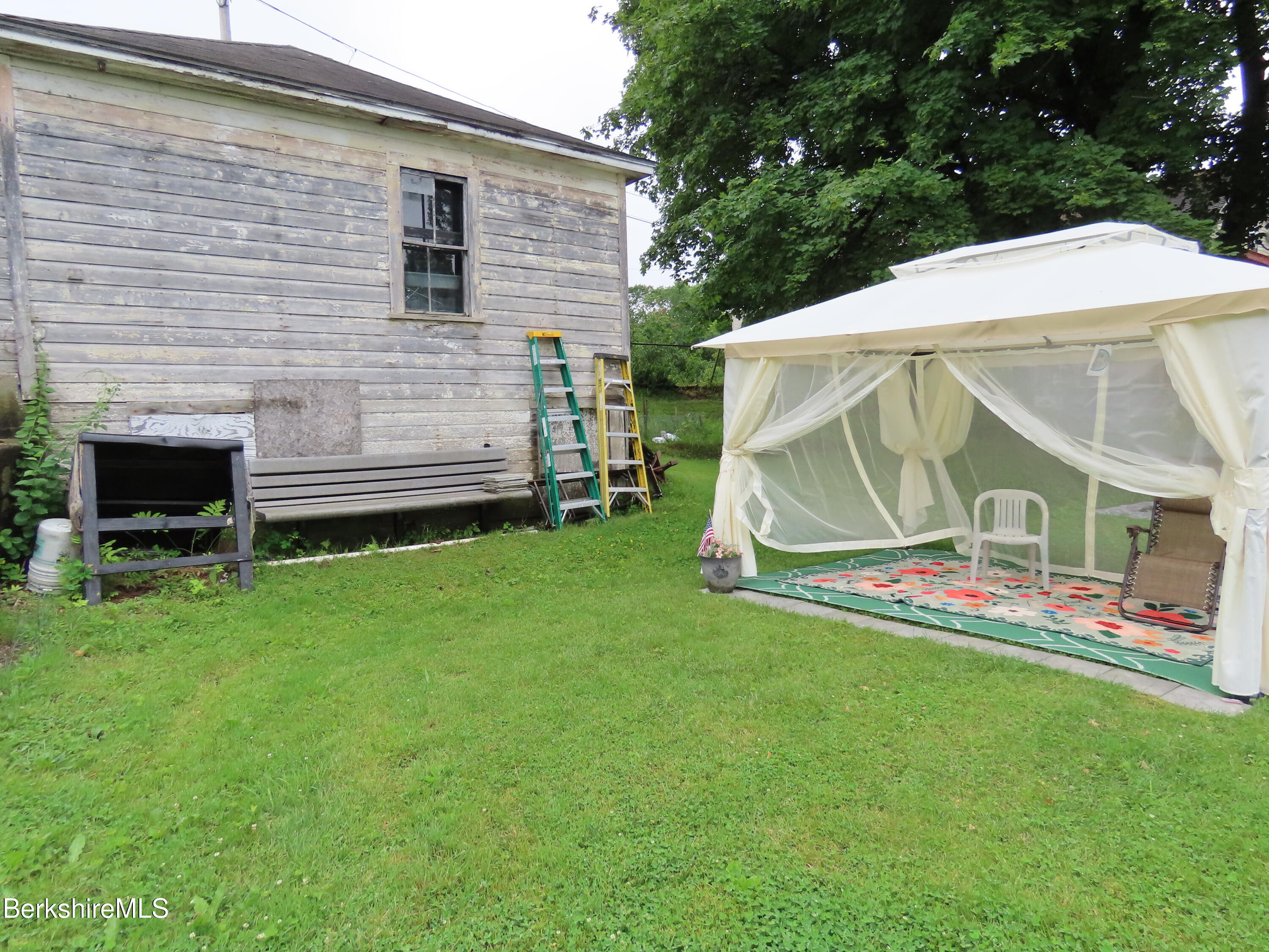 121 Commercial Street Adams, MA 01220 - Photo 46 of 49 back yard side of garage / barn