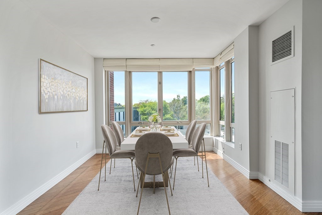 1910 Dorchester Avenue, Unit 601 Boston, MA 02124 - Photo 3 of 15 a view of a dining room with furniture window and outside view