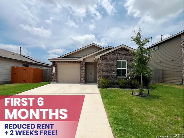 a house with garden in front of it